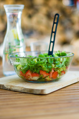 Tomato salad on a wooden board