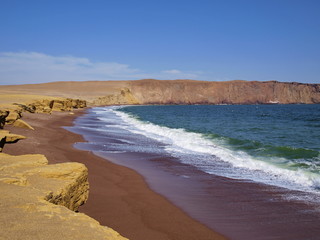 Fototapeta na wymiar red sand beach