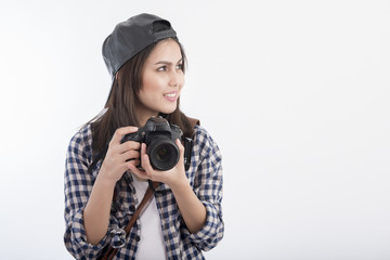 Beautiful travel girl with camera isolated on white background