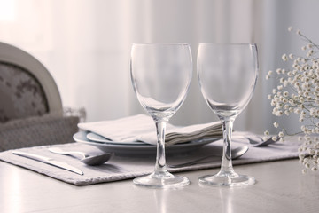 Pair of wine glasses on the wedding table, Mockup