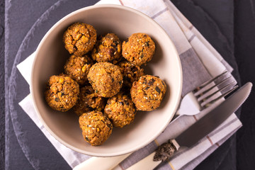 Falafel with cutlery and napkin. Jewish Cuisine. Top view