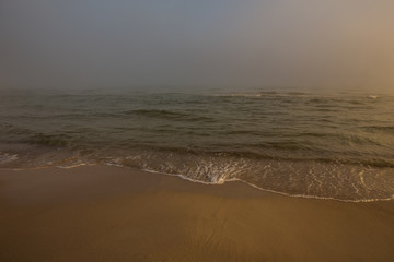 Foggy morning at the Baltic sea coast. Jastrzebia Gora, Poland