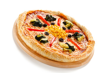 Vegetarian pizza with corn, spinach and olives 