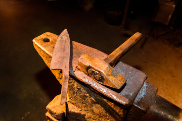 Forge, anvil, knife making.