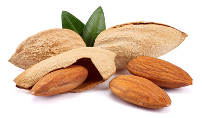 almond with green leaf isolated on white background
