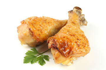 Grilled chicken leg isolated on white background