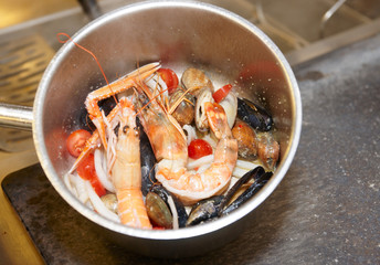 Seafood soup cooking, copy space