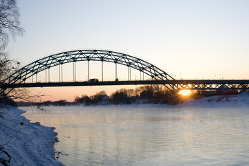Sunset on winter river