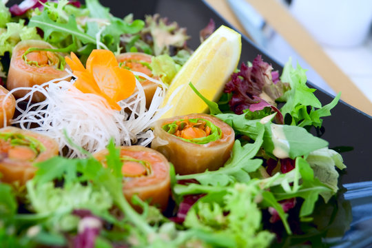 Salmon sushi with salad