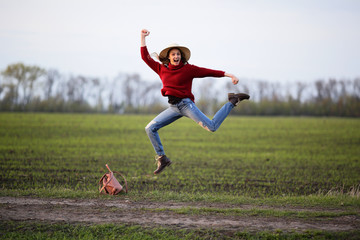 Young woman happy crazy jumping on nature