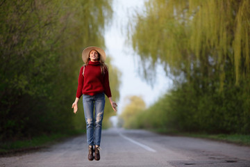 Inspired fairy flying woman in asphalt road, ease traveler, traveling, natural bacgkround