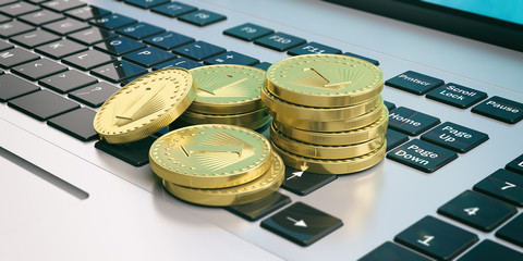Golden coins stacked on a laptop. 3d illustration