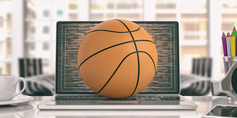Basketball on a laptop - office background. 3d illustration