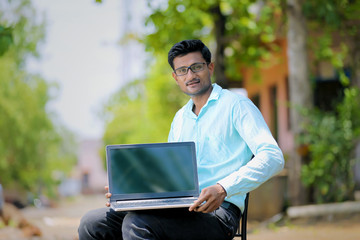 Man showing laptop Screen