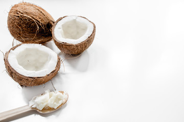 coconut food and wooden spoon on white table background top view mockup