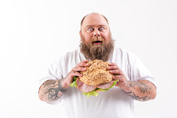 Man holding sandwich
