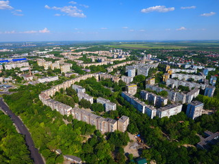 Aerial view. Houses, railway, road and traffic in the city Dnepr, Ukraine.