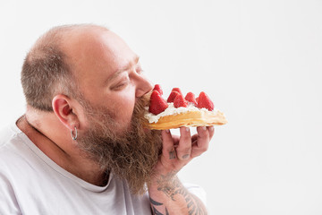 Man eating cake
