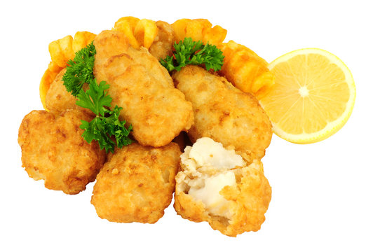 Cod fish nugget bites with curly fries isolated on a white background