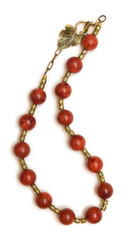 Nice necklace with red beads isolated on white background