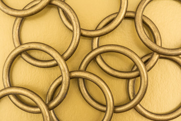 metal rings on a golden background