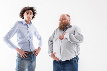 Confident men posing