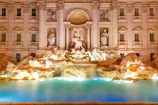Rome Trevi Fountain or Fontana di Trevi in the morning, Rome, Italy. Trevi is the largest Baroque, most famous and visited by tourists fountain of Rome.