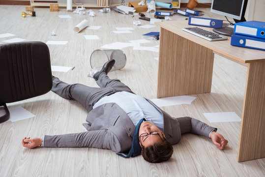 Businessman dead on the office floor