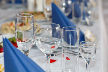 Served with Cutlery and napkins to table. A Banquet with food and snacks with a luxurious setting on a white tablecloth.