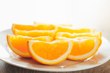 Fototapeta na wymiar fresh orange slices on a plate