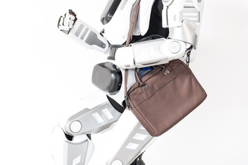 Modern robot is running with handbag