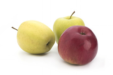 Red and green apples on a white background