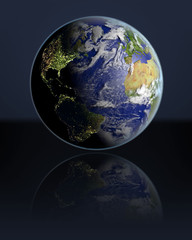 Globe facing Northern Hemisphere in dark