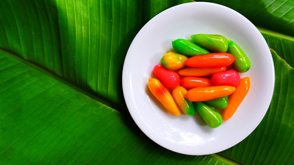 Thai traditional dessert by sweet green bean and glaze with jelly. sweet chilli shape.