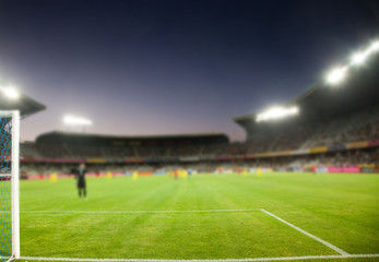 Fototapeta na wymiar evening stadium arena soccer field defocused background