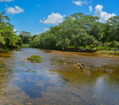 The Macal River Flowing through San Ignacio, Belize.