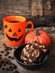 Chocolate brownies cake with black coffee for halloween party