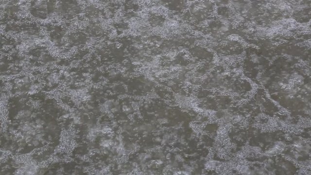 Moving water in a fast filter backwash operation. Water treatment plant located in Taipei, northern Taiwan. Backwashing process.