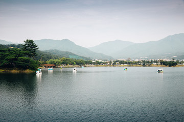 Duck boat on lake with mountain at Uirimji Reservoir in Jecheon, Korea