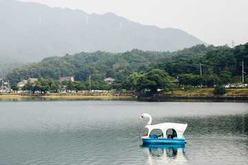 Duck boat on lake with mountain at Uirimji Reservoir in Jecheon, Korea