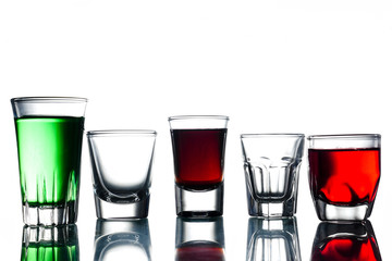 Collage of glasses with cocktail on a white background.