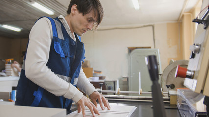 Worker man at Polygraphy printing industry