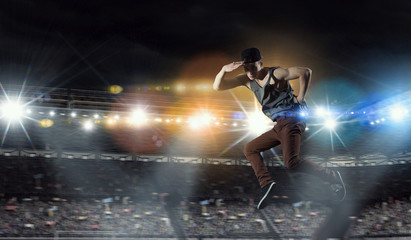 Naklejka premium B-boy performing some moves . Mixed media