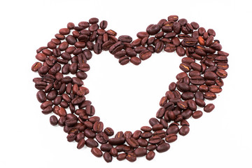 Heart of coffee beans isolated on white background