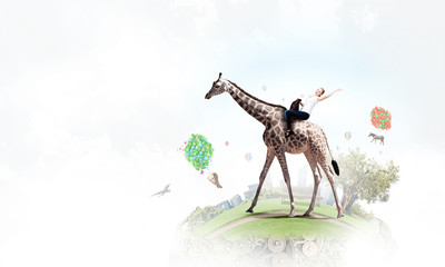 Girl saddle giraffe © Sergey Nivens