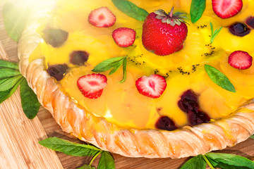 Fruit pizza with strawberries kiwi pineapple