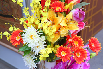 The artificial flowers.