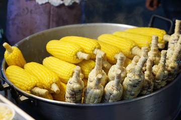 fresh corncob at hot water bowl in Thailand