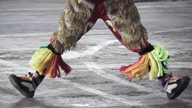 Detail of feet and costume of the Scissors dance, Peru. Slow motion