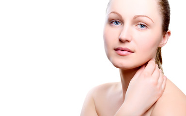 Naklejka premium Portrait of girl with nude make-up with hand on neck isolated on white background, free space for text. Girl with clean healthy skin on white, copy space. Beauty model isolated on white